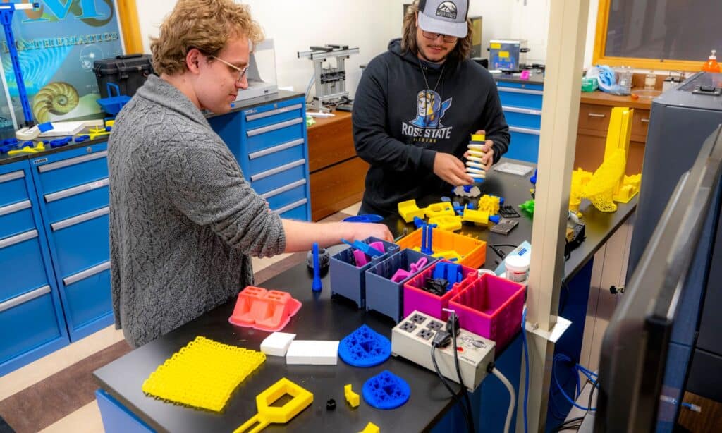 two male students experimenting with STEM projects