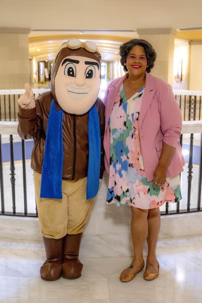 Dr. Emily Stacey and Rowdy the Raider pose together at Oklahoma's Capitol